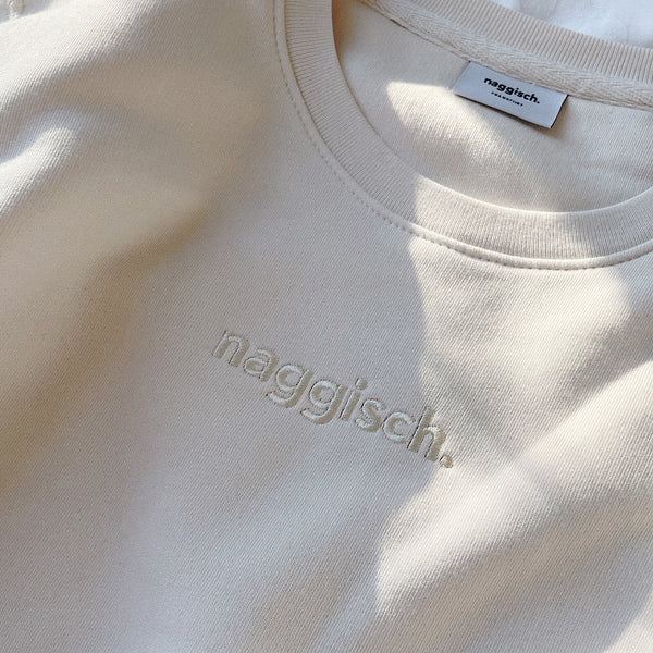 naggisch. sweatshirt creme